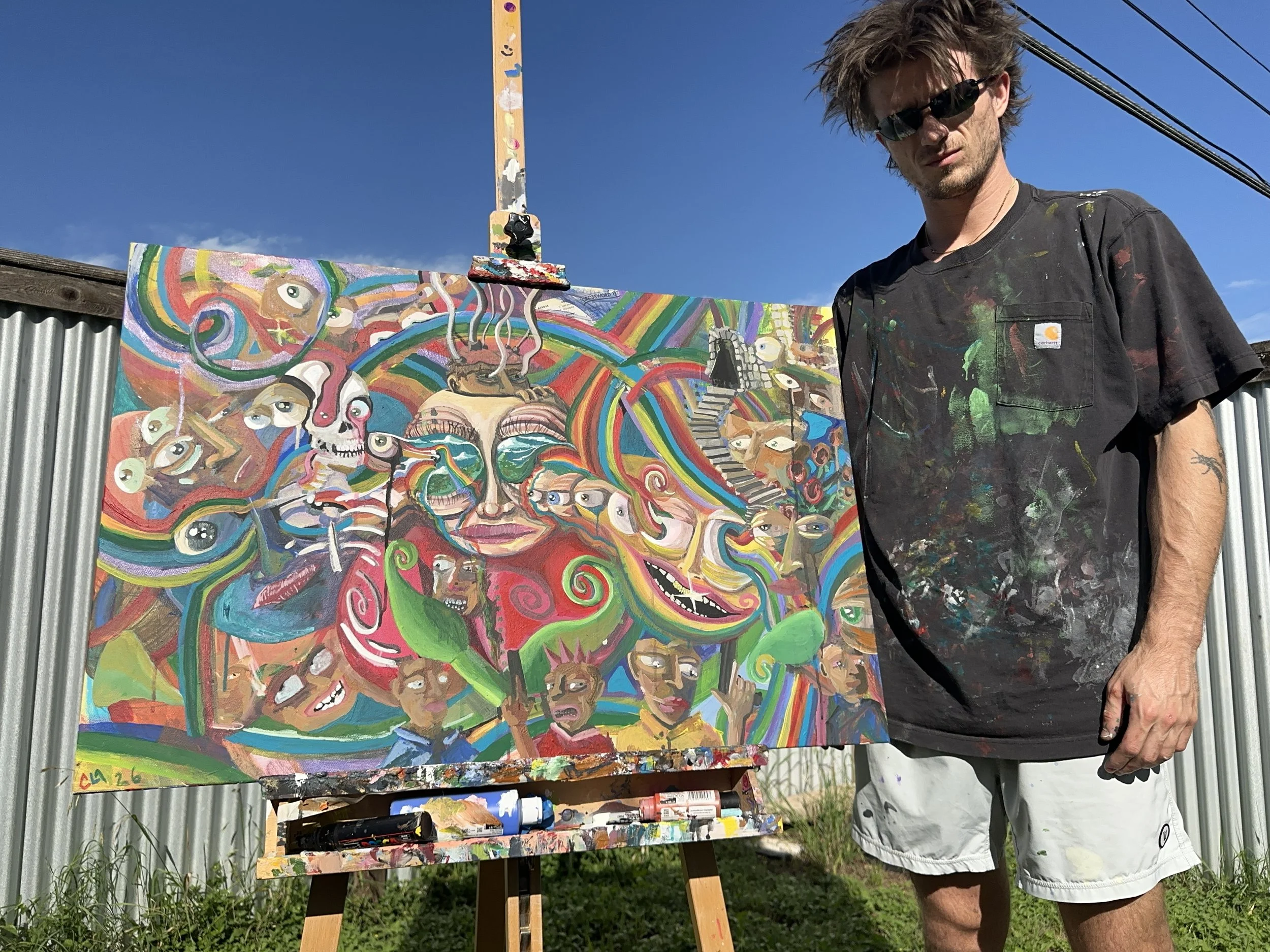 Clay in the studio, beside a painting on the easel